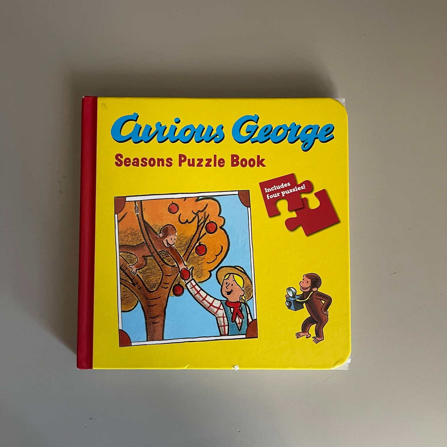 Curious George Seasons Puzzle Book