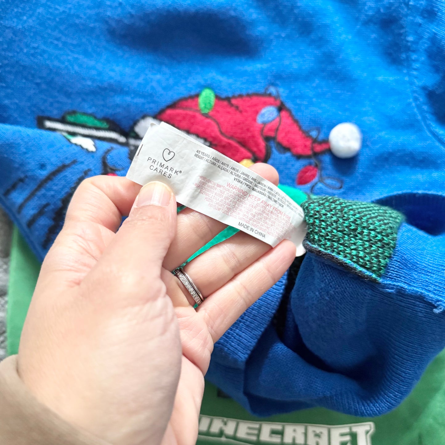 Primark / Blue santa hat dinosaur knit pullover / 3-4Y