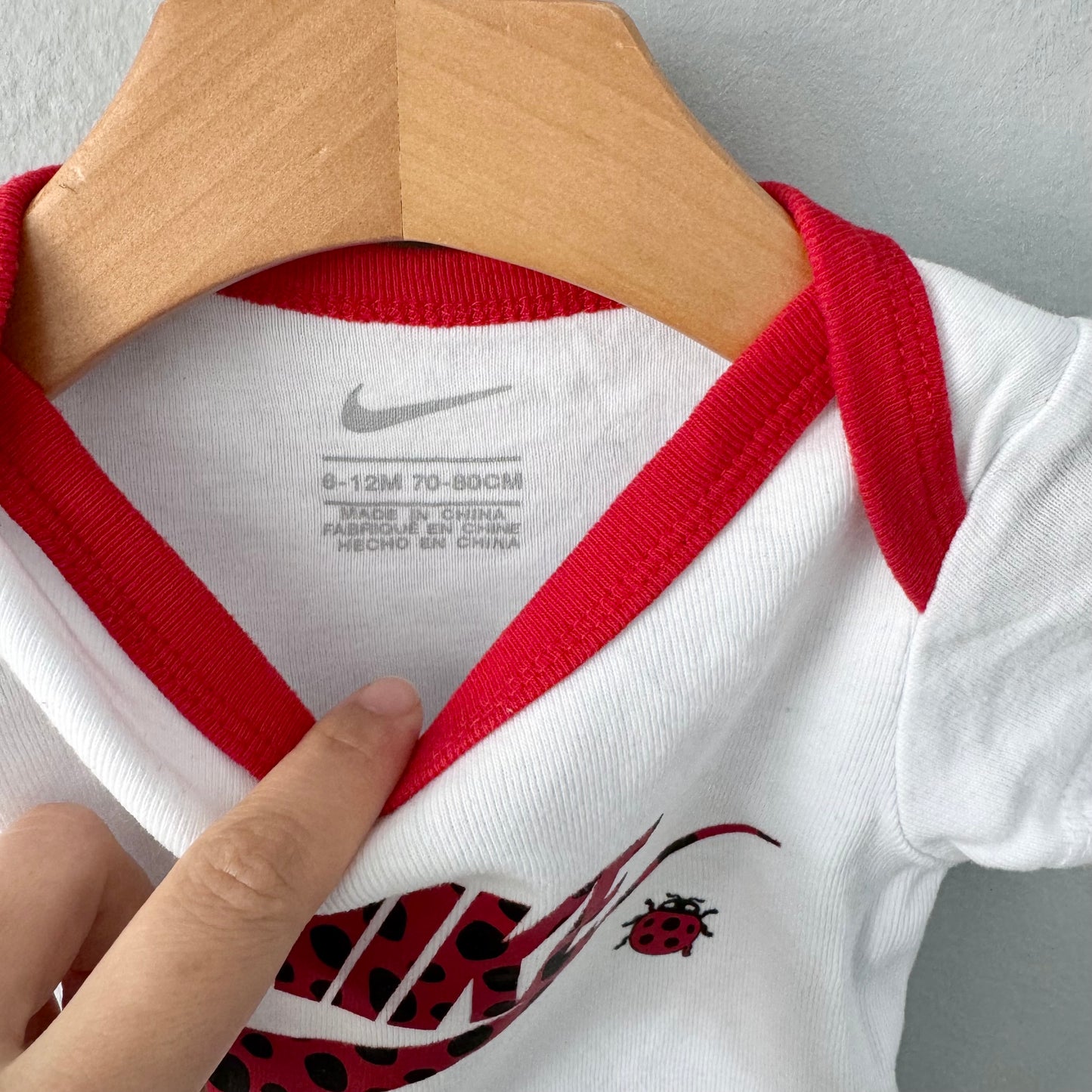 Nike / White red ladybug onesie / 6-12M