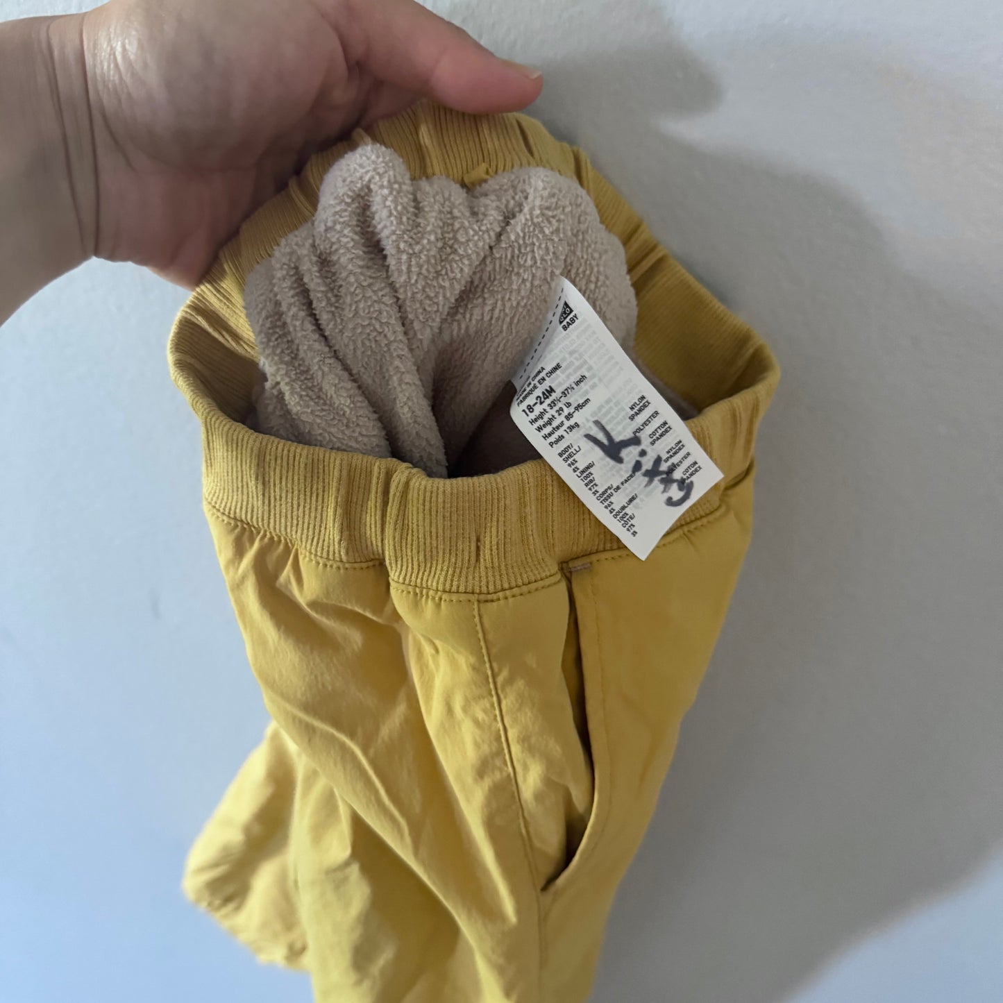 Uniqlo / Mustard fleece lined nylon pants / 18-24M