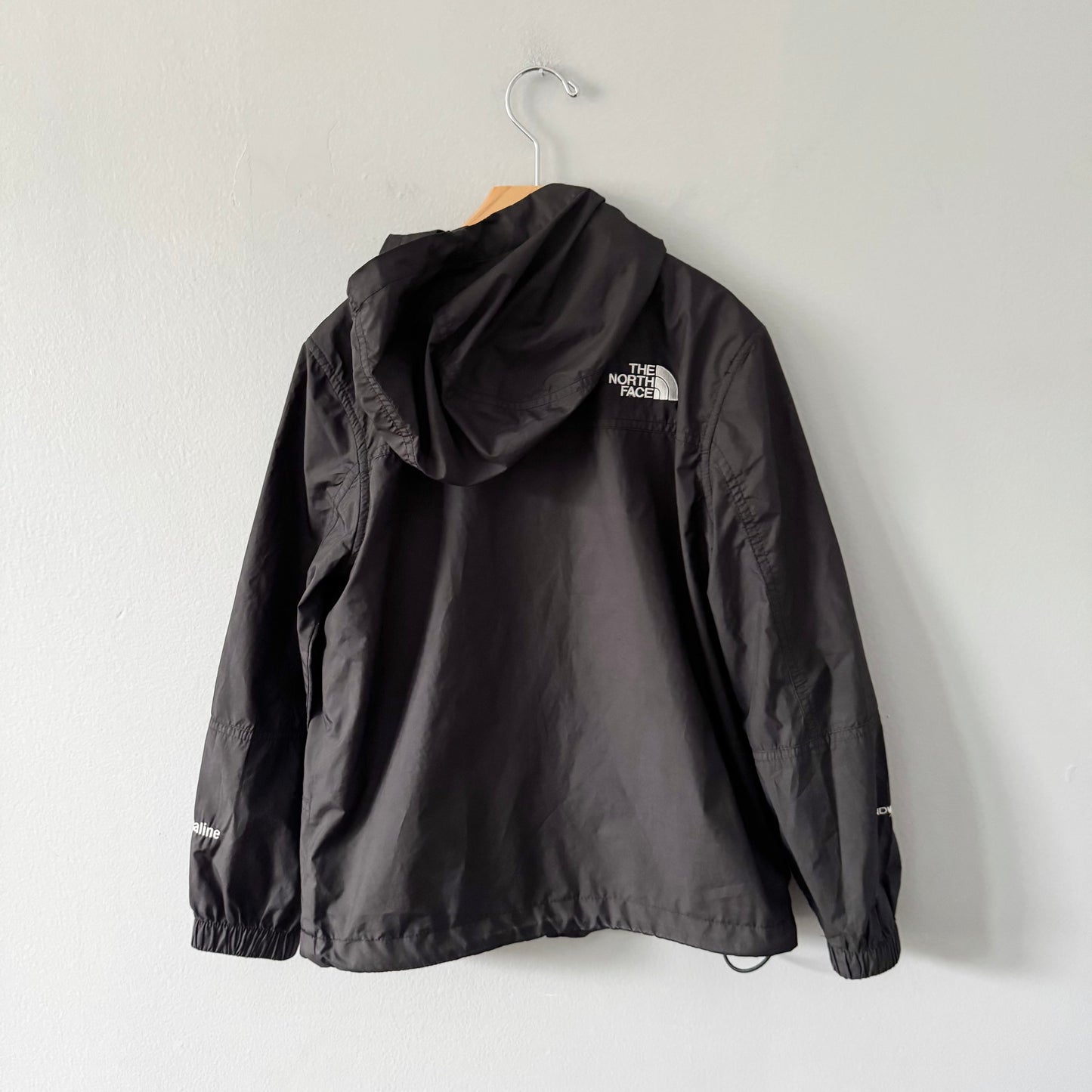 The North Face / Black windbreaker / 7-8Y