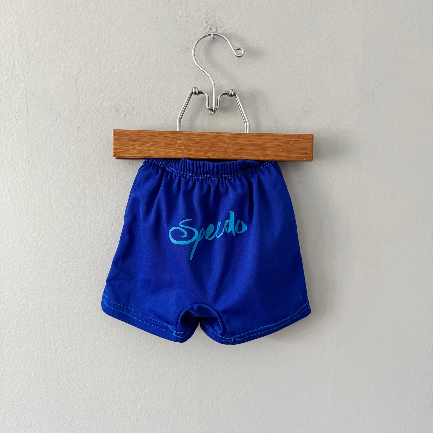 Speedo / Blue swim trunks / 3-6M