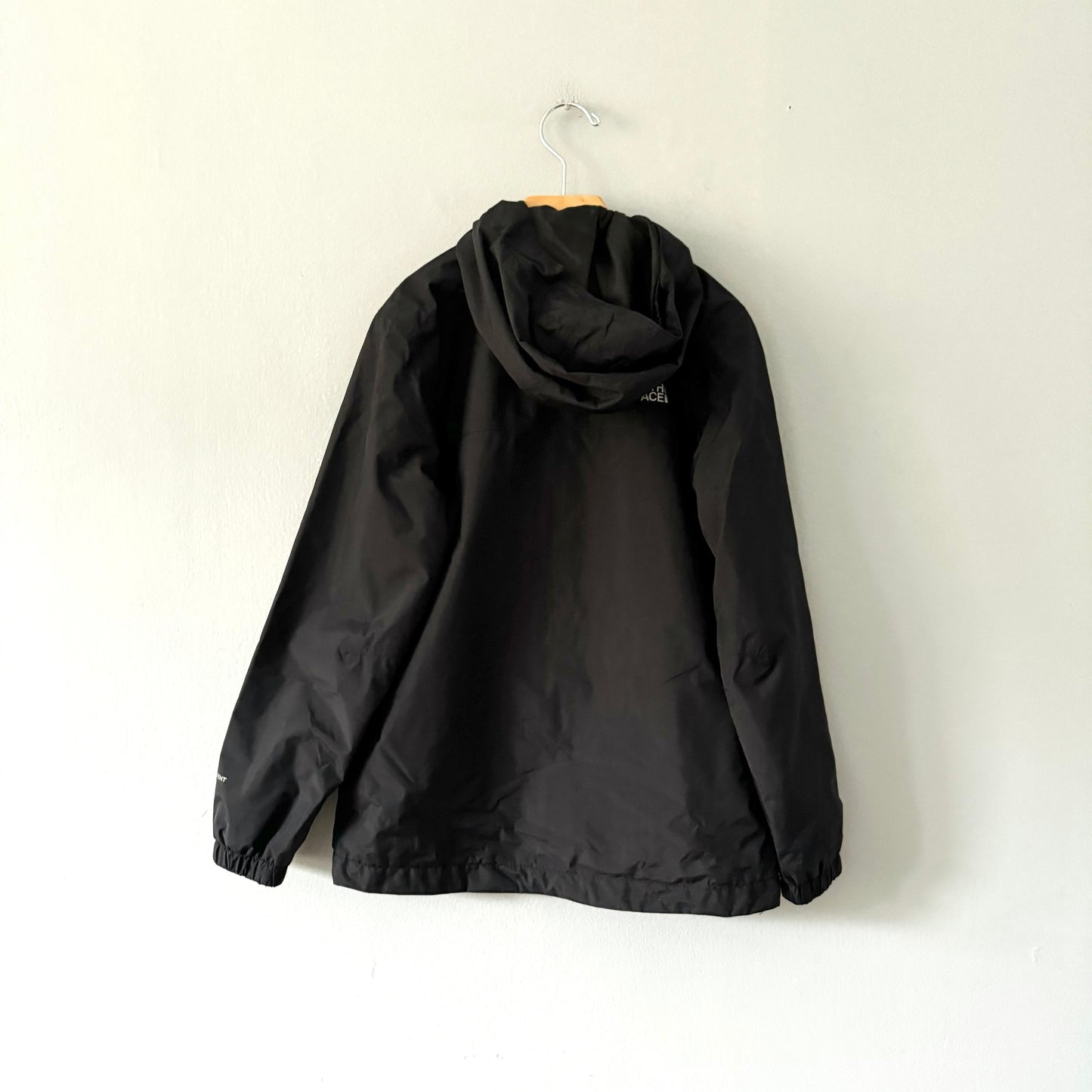 The North Face / Black windbreaker / 7-8Y