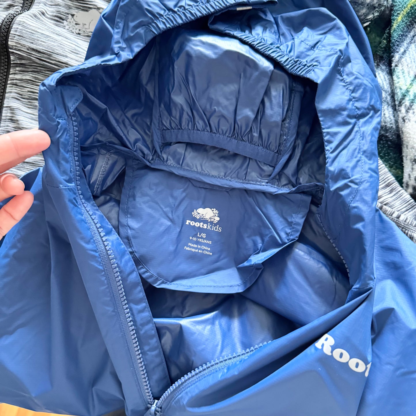 Roots / Coupe-vent marine (pliable) / 9-10 ans