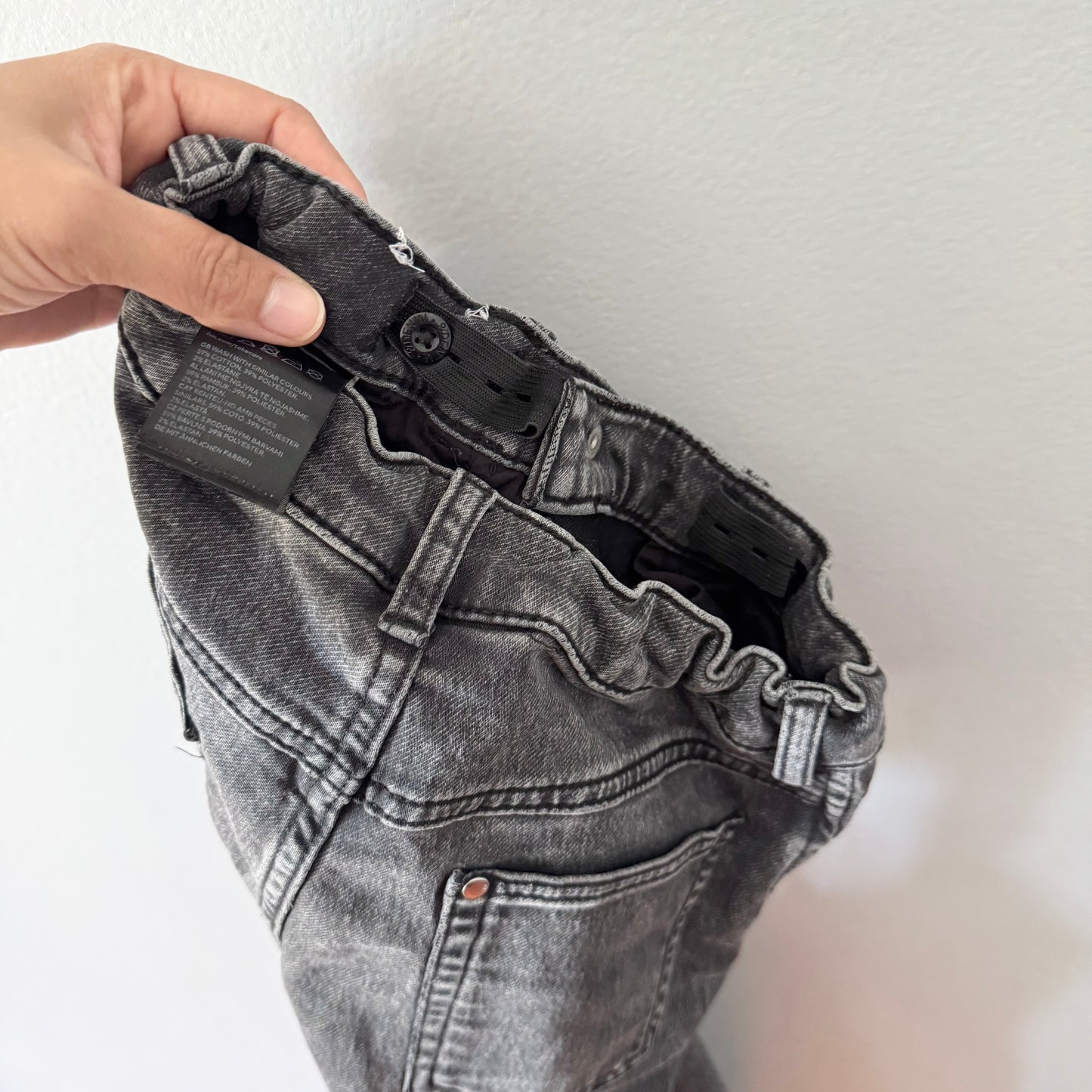 H&M / Black stretch denim / 7-8Y