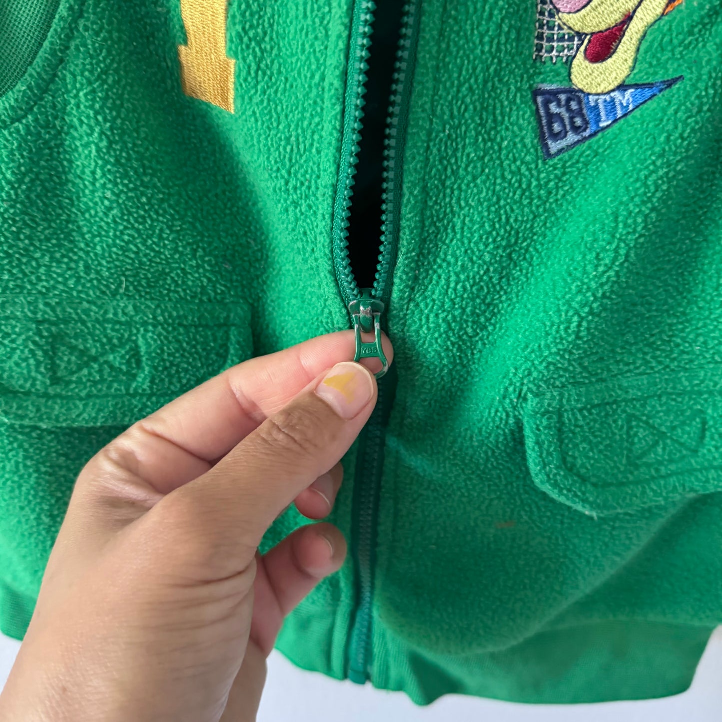 Disney / Green Tigger fleece vest / 18M
