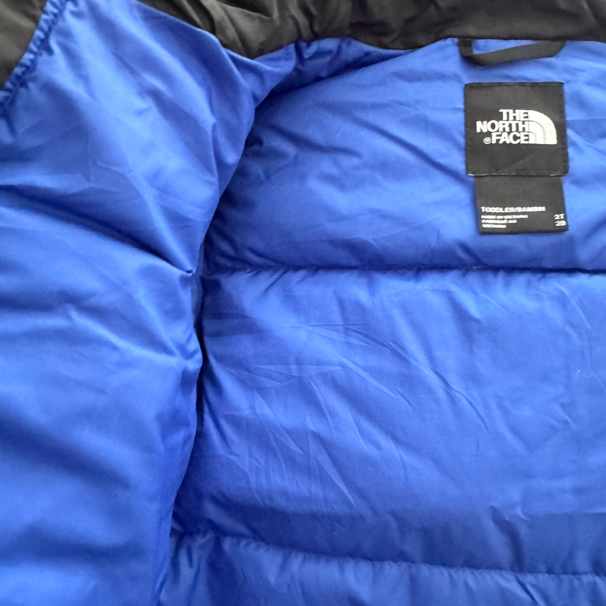 The North Face / Blue black puffer jacket / 2T