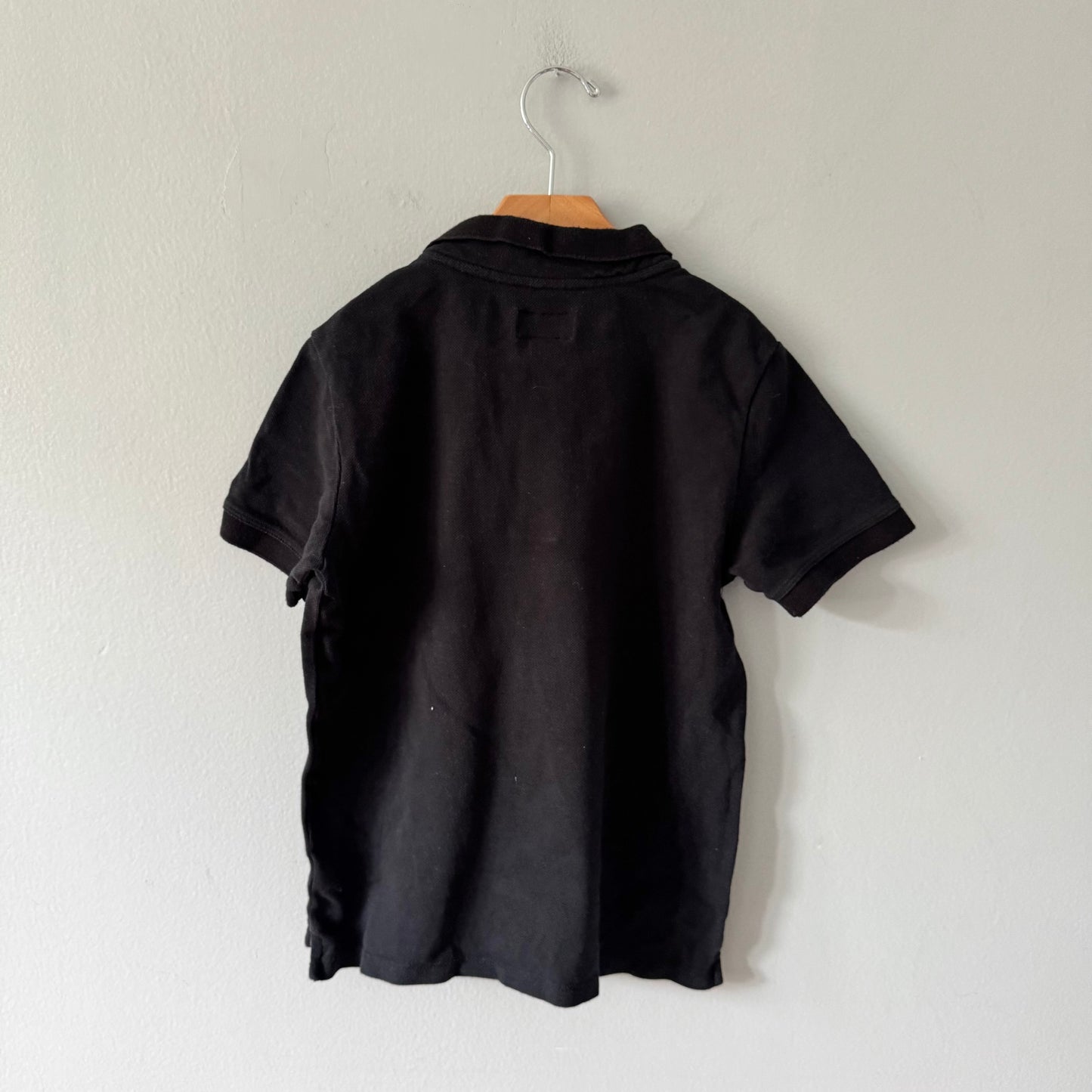 Roots / Black polo shirt / 7-8Y