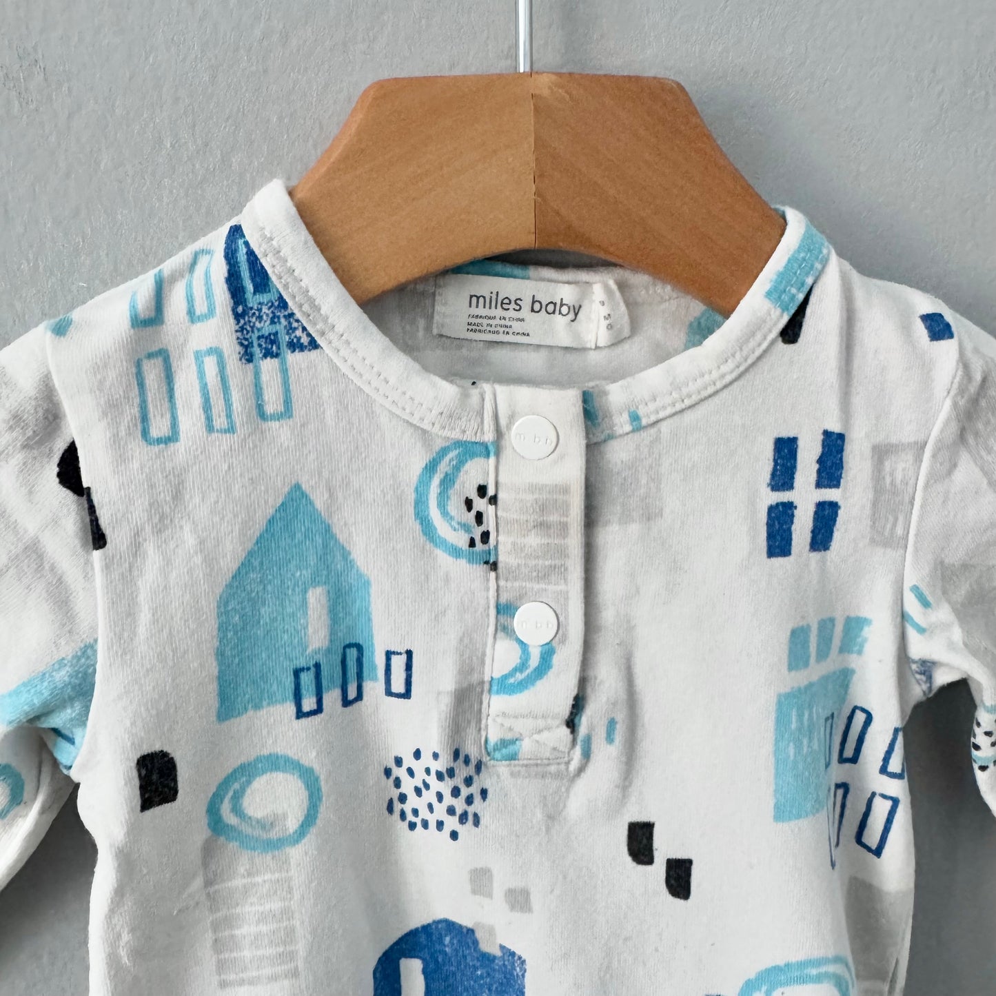 Miles baby / White x blue onesie / 9M