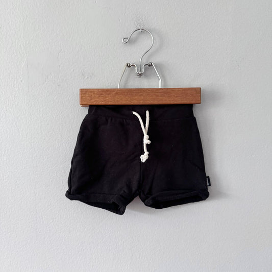 Whistle & Flute / Black bamboo shorts / 12-18M