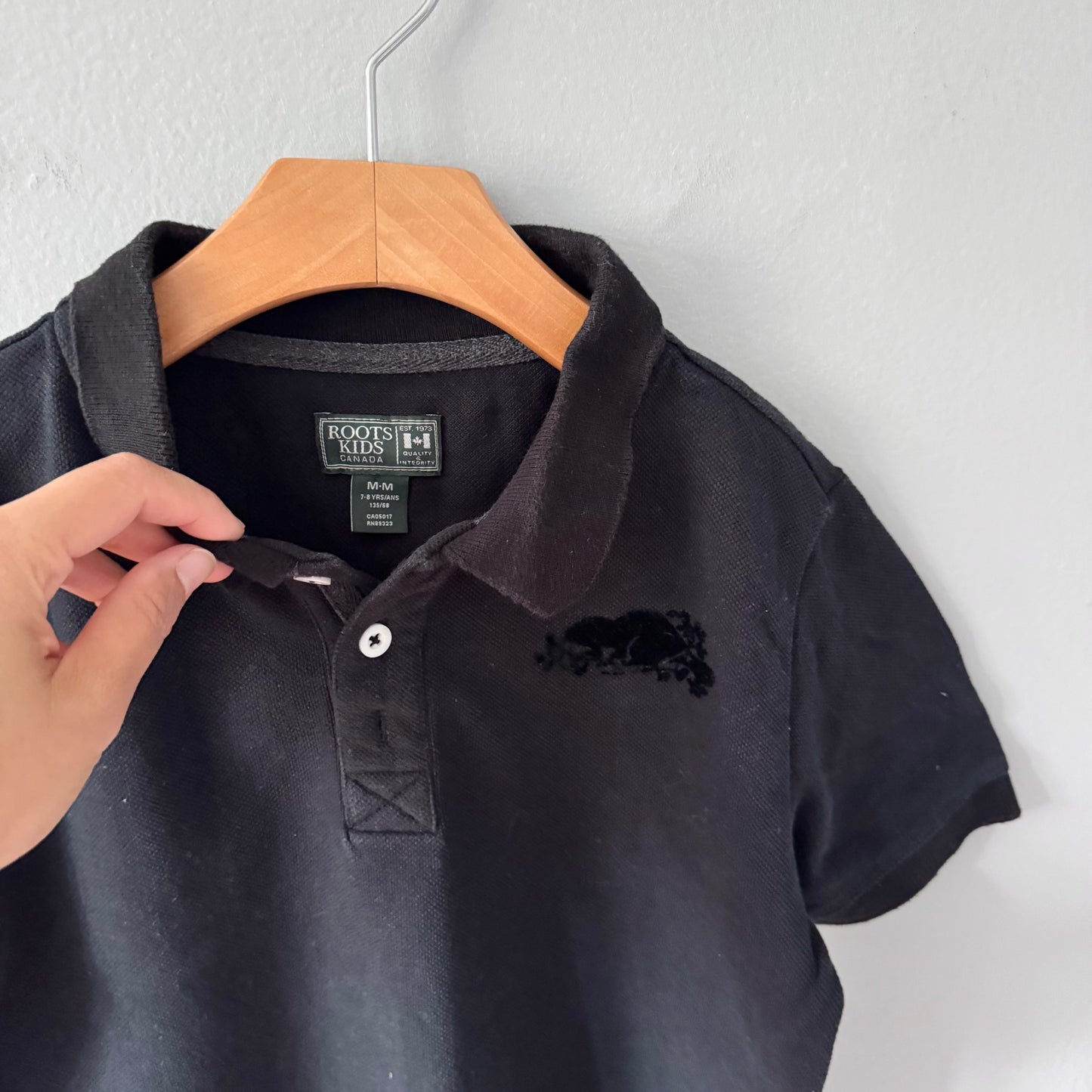 Roots / Black polo shirt / 7-8Y
