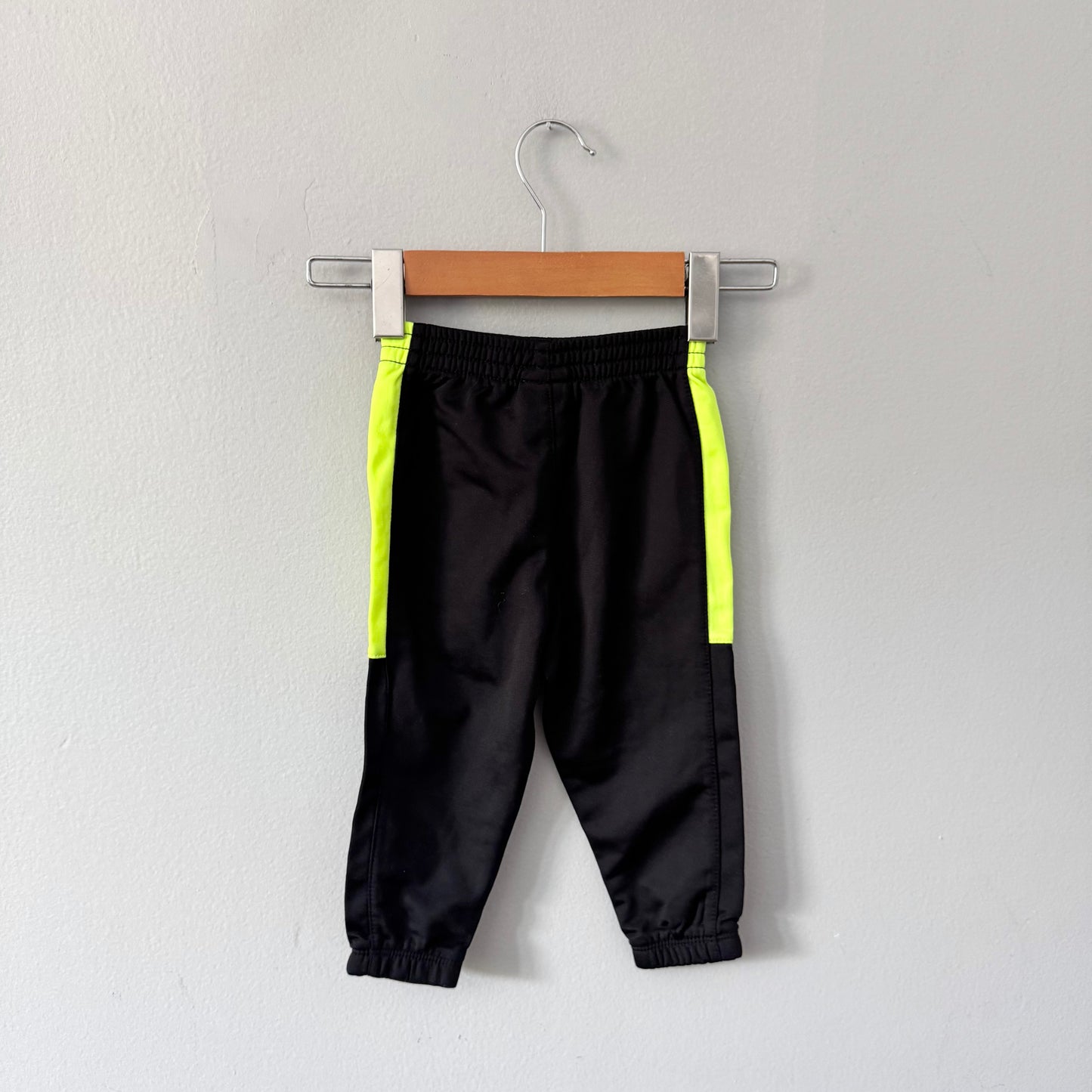 Nike / Pantalon de survêtement noir et jaune / 18M