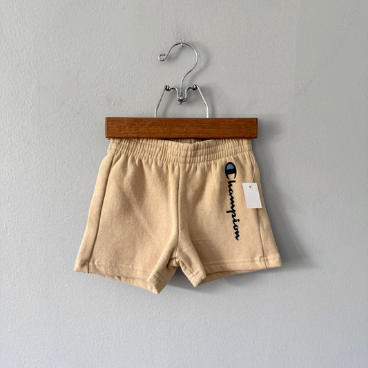 Champion / Beige crew shorts / 12M