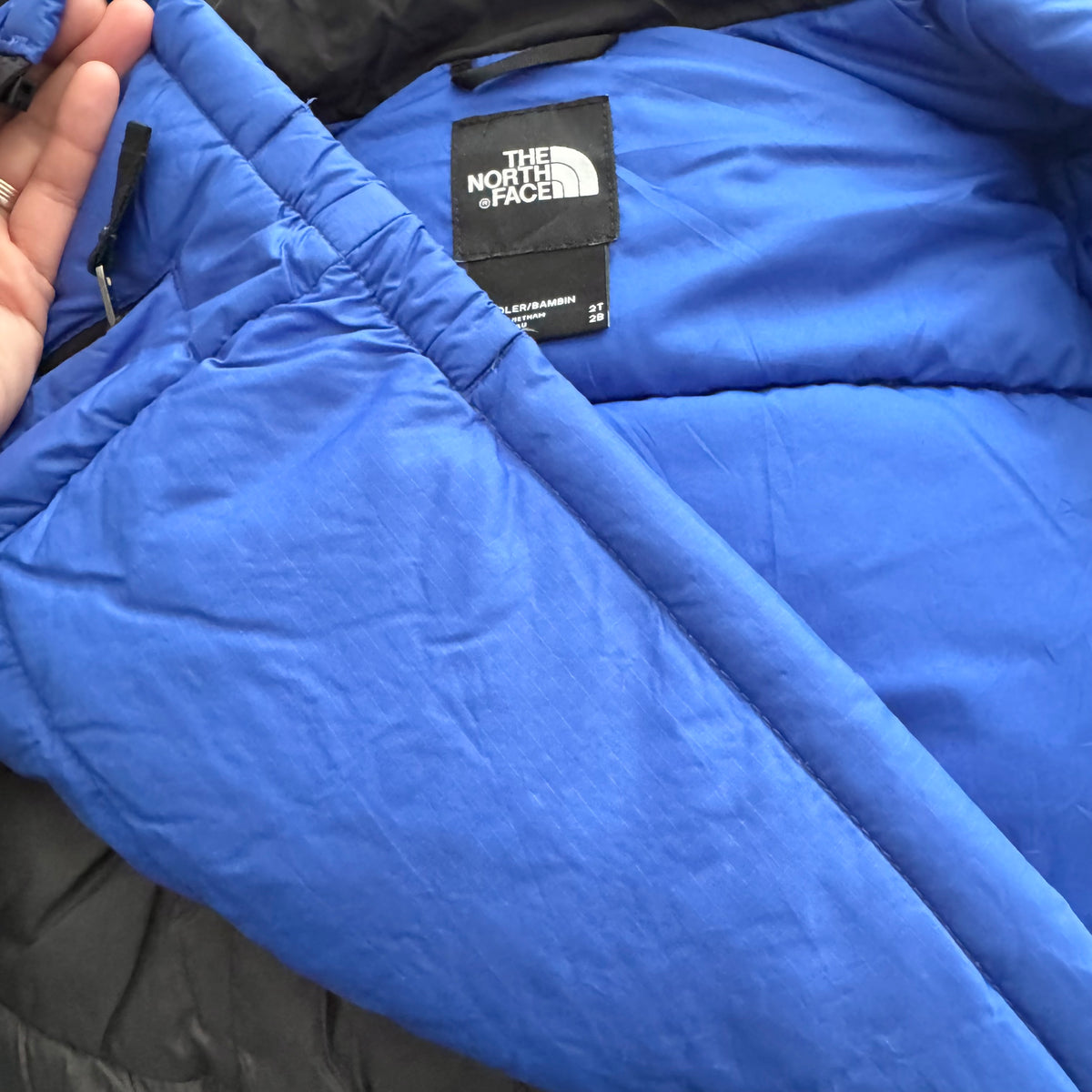 The North Face / Blue black puffer jacket / 2T