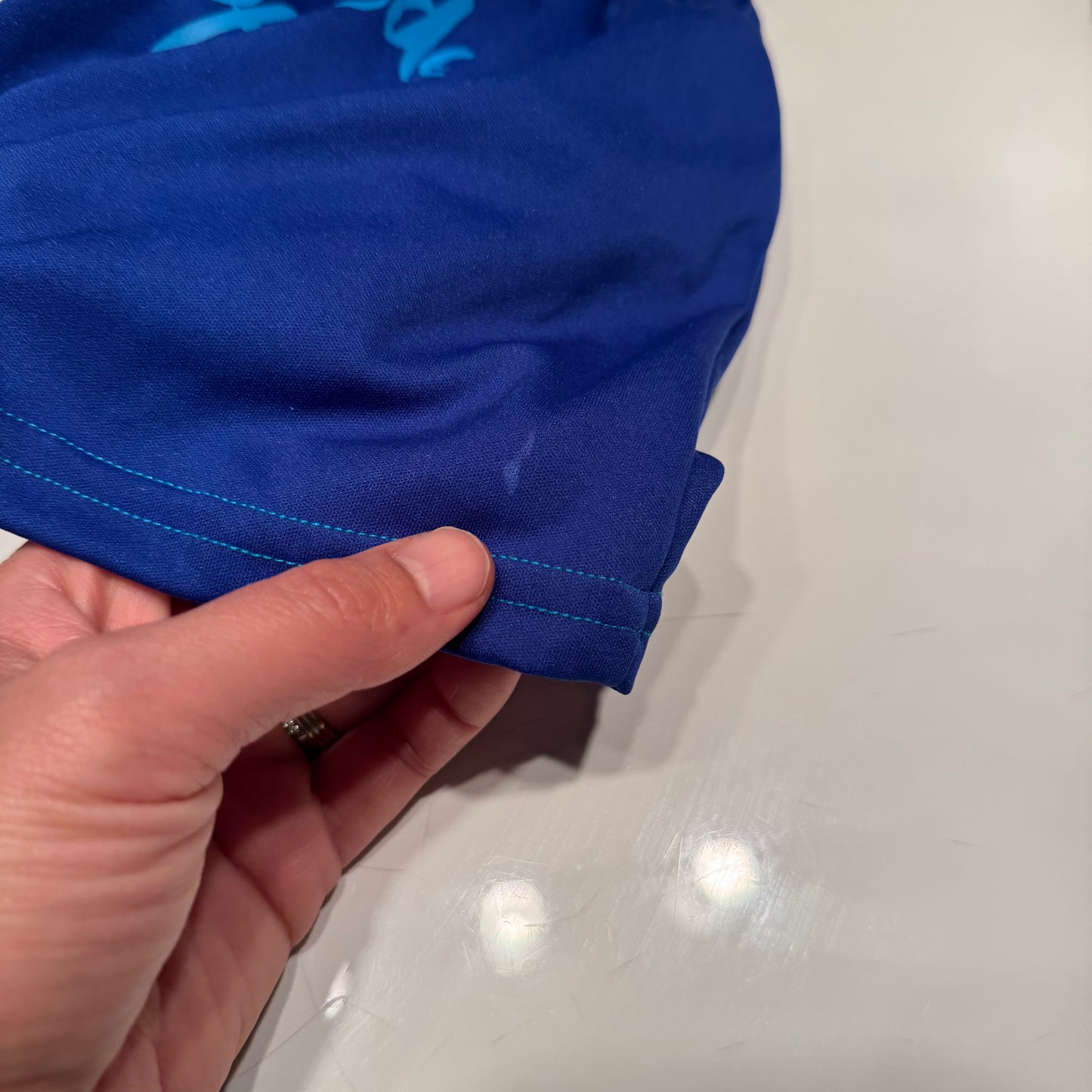Speedo / Blue swim trunks / 3-6M